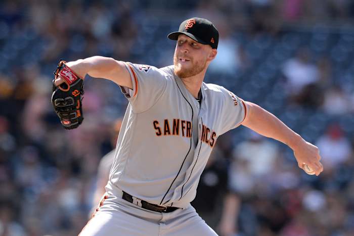 SF Giants relief pitcher Will Smith works against a San Diego Padres batter during the tenth inning at Petco Park. (2018)